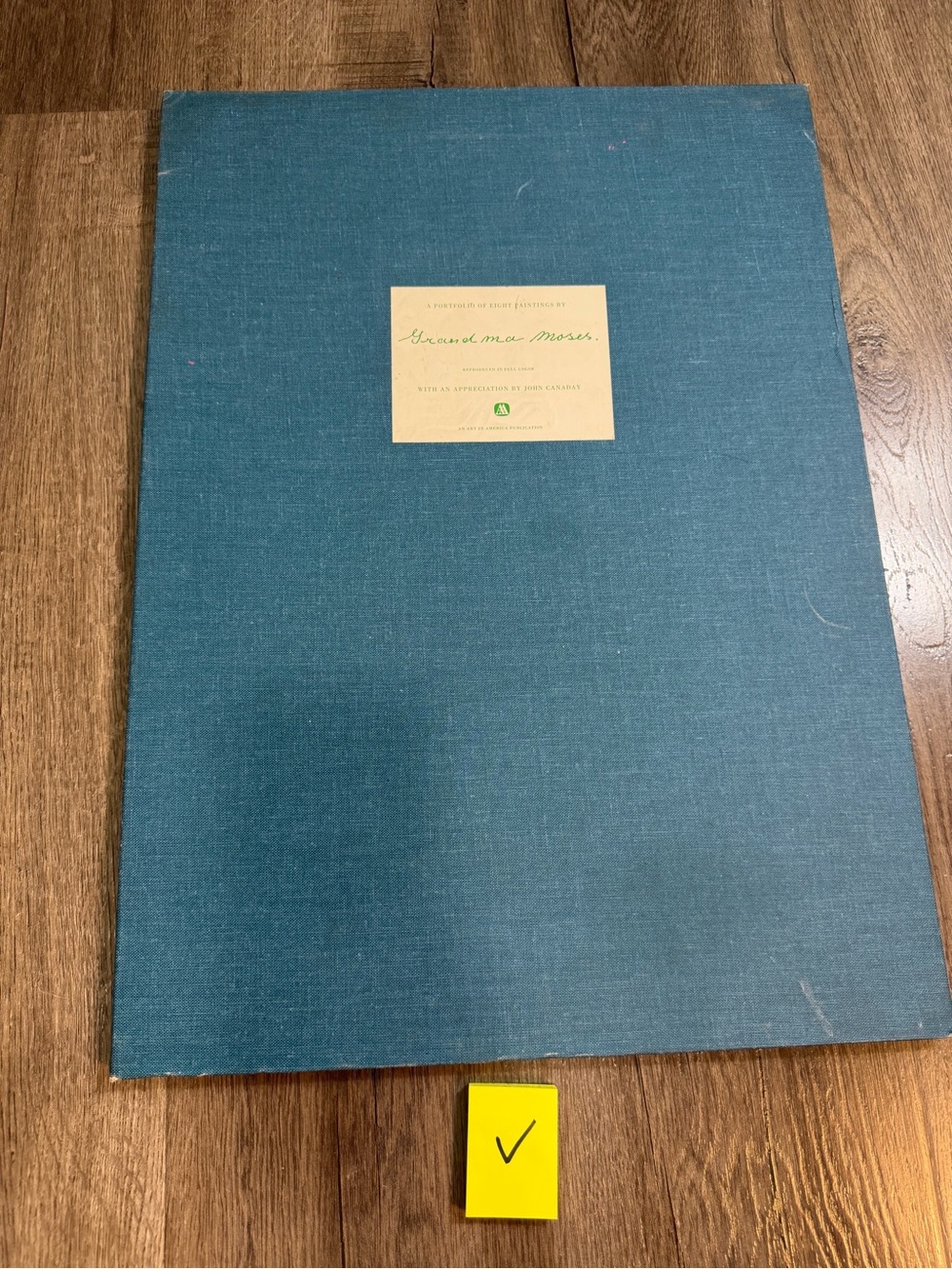 vintage portfolio of art reproductions by Anna Mary Robertson Moses